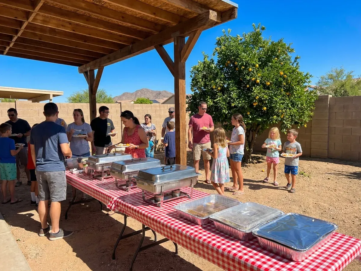 BBQ catering spread at a Peoria, AZ backyard gathering
